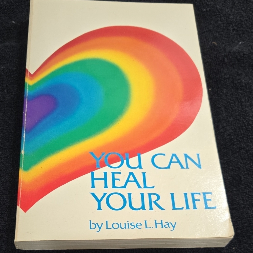 You Can Heal Your Life Book with Rainbow Heart Cover